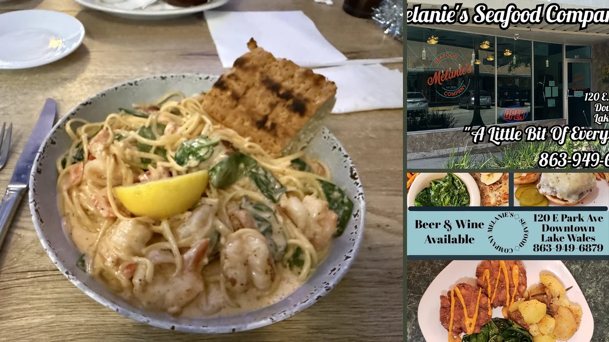 Fresh fish dish beside a lemon wedge.