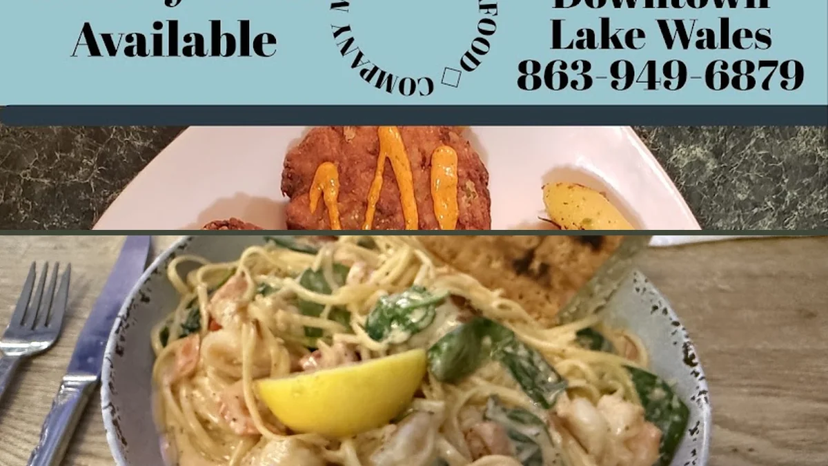 Plated seafood with fries on a simple table.